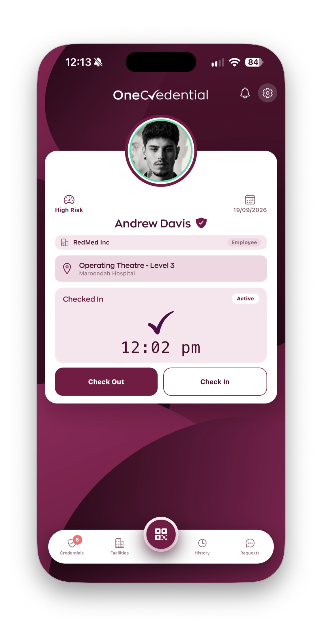 OneCredential mobile app showing a high-risk representative checked in onsite